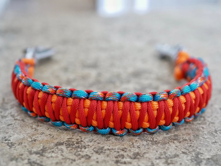 Red, orange and teal cobra weave paracord bracelet